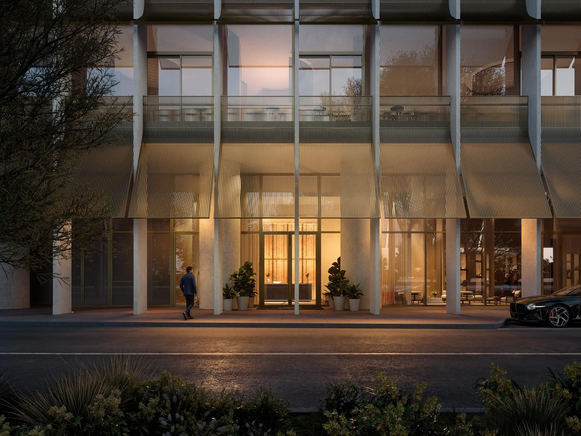 Residential drop-off and lobby on Al Mustaqbal Street at dusk — Carlyle Residences Dubai