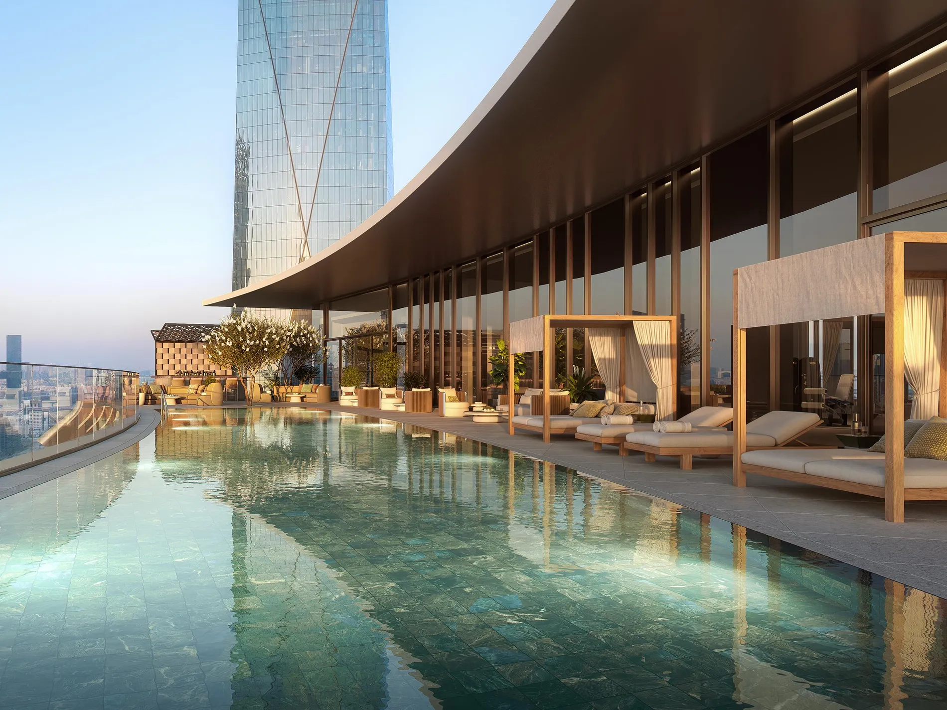 Canopy daybeds beside the rooftop pool — Carlyle Residences Dubai